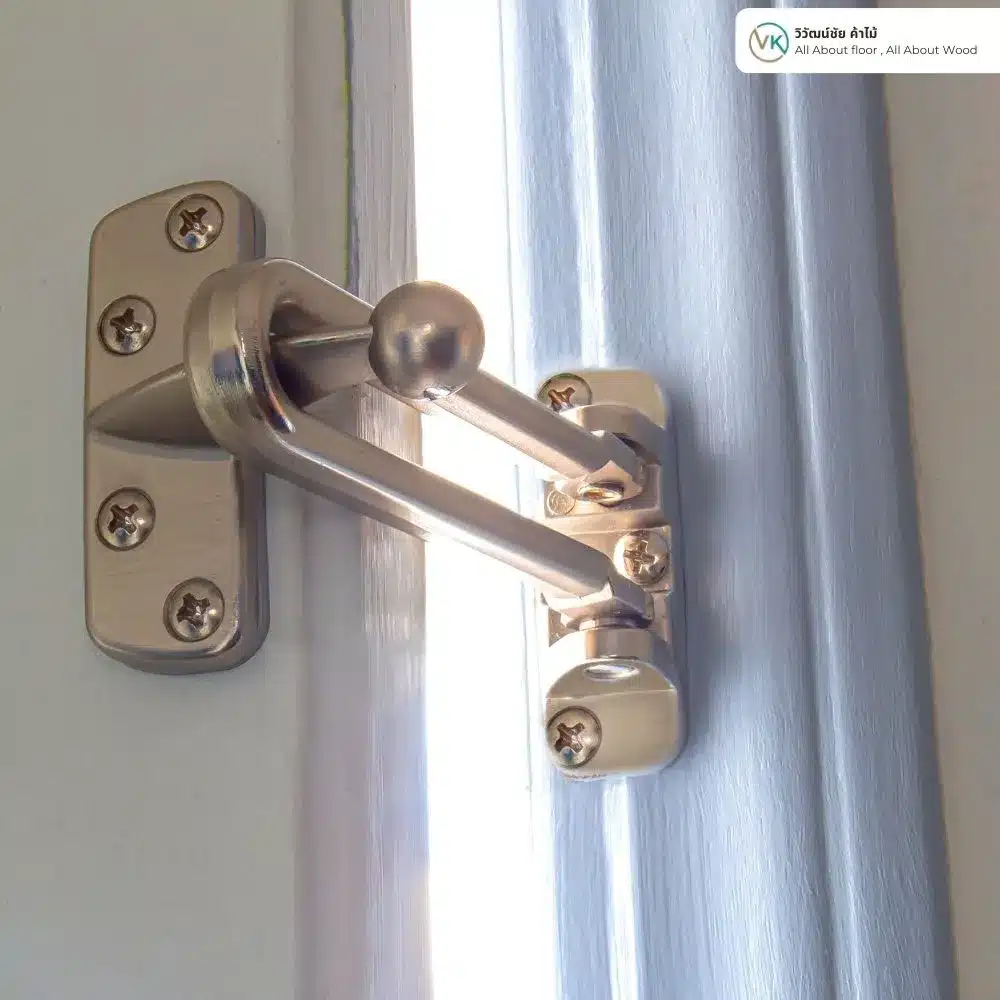 Satin Swing Bar Latch on Door Frame_result Stainless swing bar latch installed on a reinforced white door