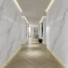 Laminate Sheet Stone Pattern TD Board Shallow Carrara 8873 PL Stone Pattern Corridor Application ลามิเนตปิดผิวเฟอร์นิเจอร์ลายหินอ่อน แบรนด์ TD Board ขาวลายเส้นเทาอ่อน รหัส 8873 PL ตัวอย่างการใช้ในโถงทางเดิน